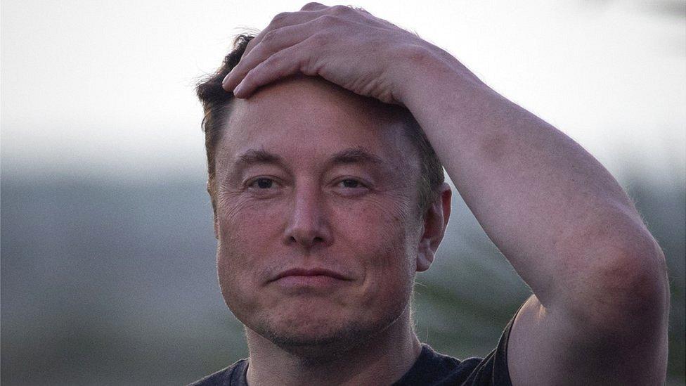 Elon Musk takes part in a news conference at the SpaceX Starbase.