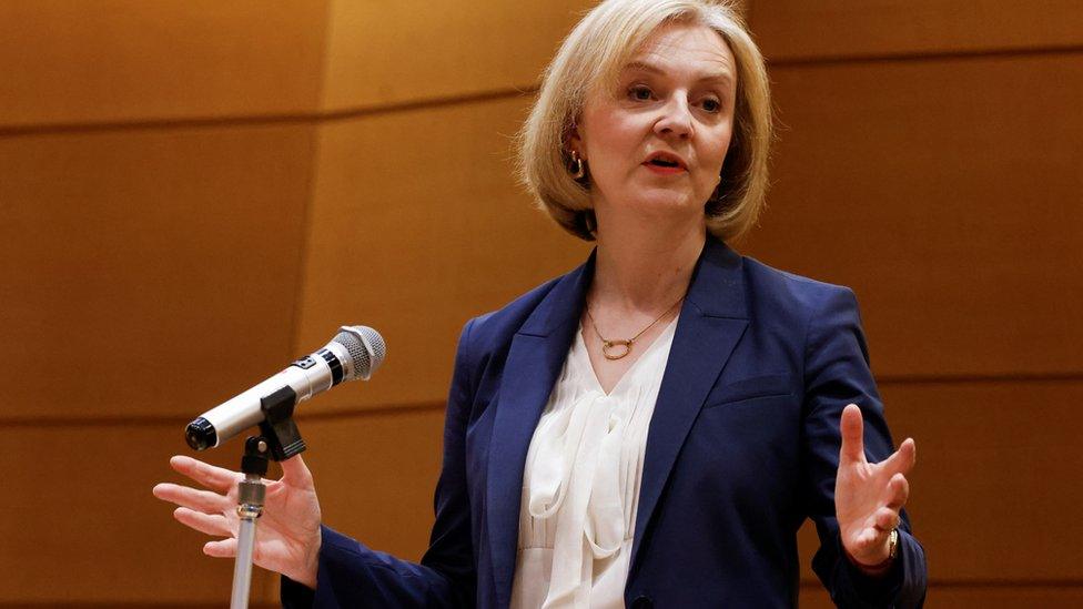 Liz Truss delivers a speech in Tokyo