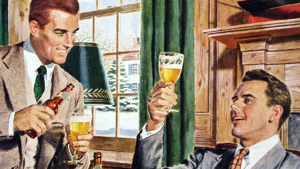 Two men drinking beer