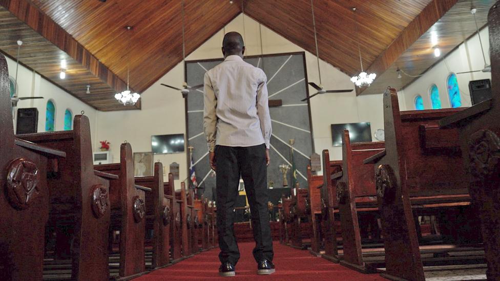 Peterson Sonyah in St Peter's Lutheran Church in Monrovia, Liberia