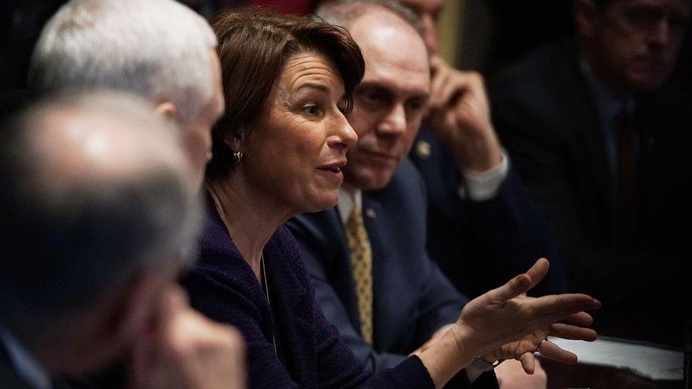 U.S. Sen. Amy Klobuchar (D-MN) (L) speaks as House Majority Whip Rep. Steve Scalise (R-LA) (R) listens during a meeting with President Donald Trump at the Cabinet Room of the White House February 28, 2018 in Washington, DC.