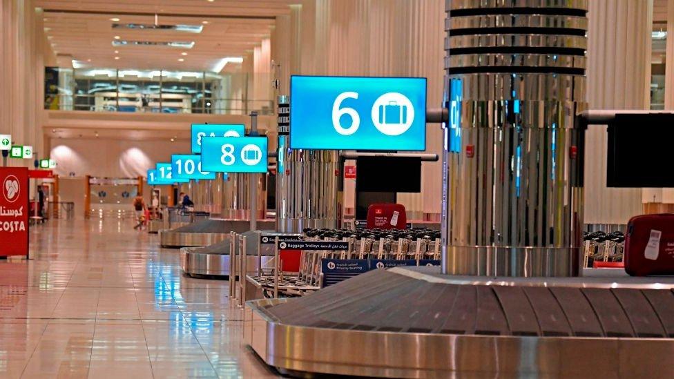 empty airport luggage carousels