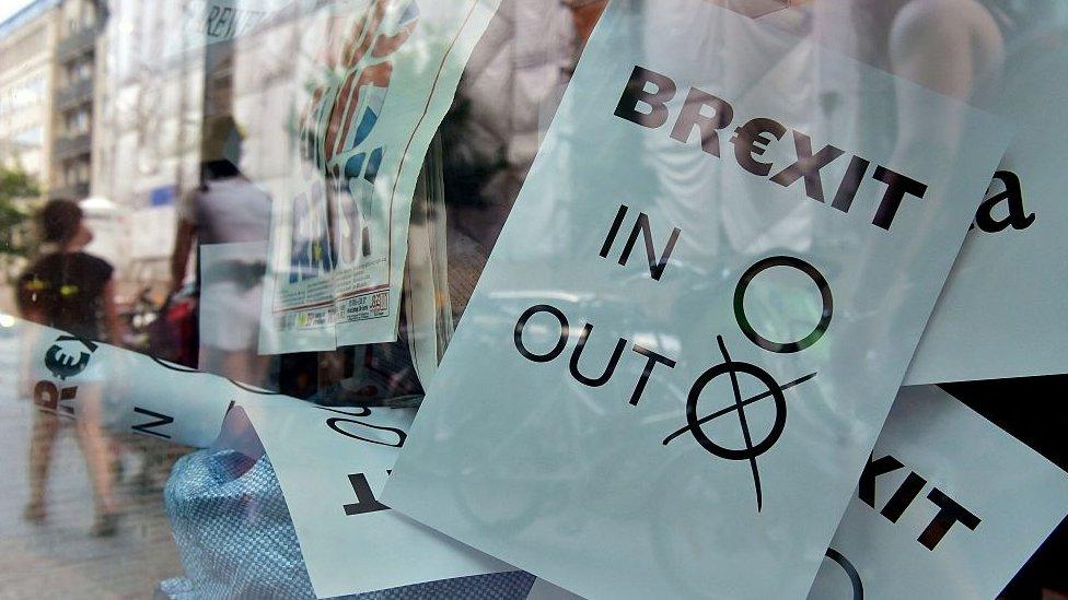 A poster featuring a Brexit vote ballot with 'out' tagged