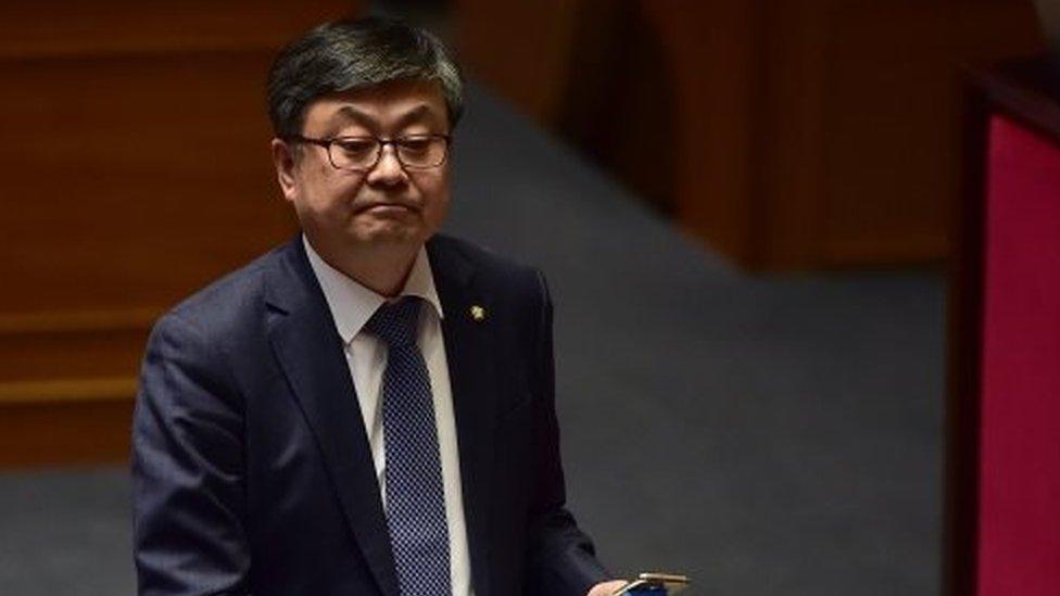 Choi Won-Sik, a lawmaker of South Korea's opposition People's Party, walks to the podium to call for revision of a disputed anti-terrorism bill on the main floor of the parliament in Seoul (29 February 2016)