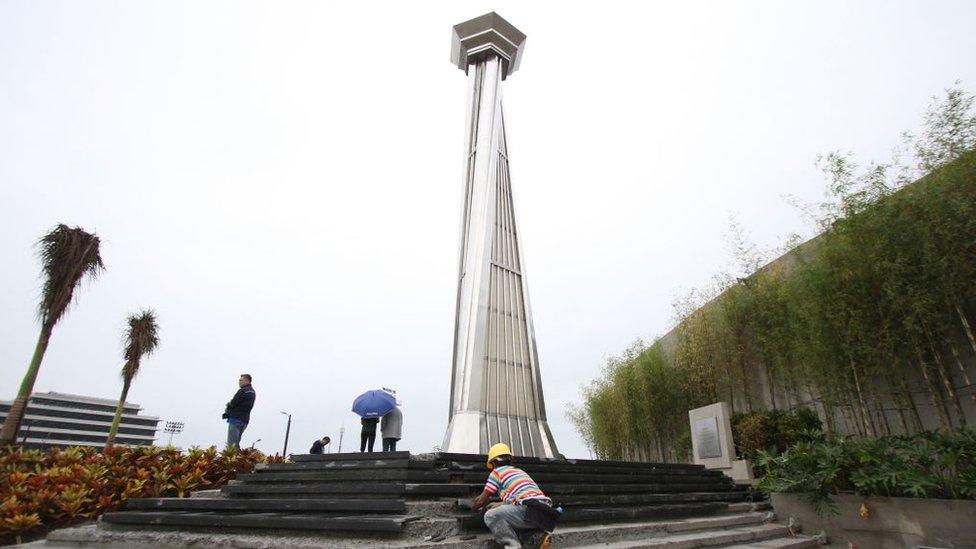 This photo shows workers preparing steps leading to the cauldron tower at the athletics stadium for the SEA games