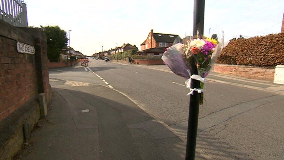 Flowers at the scene of a fatal crash