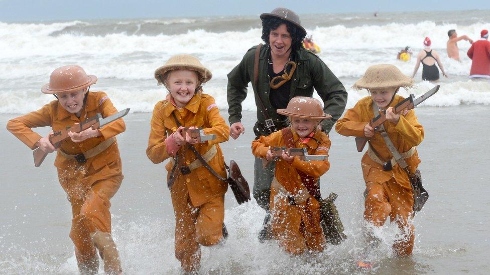 Children in Christmas swim