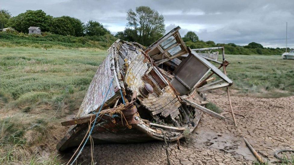 Abandoned boat at Heswall Shore