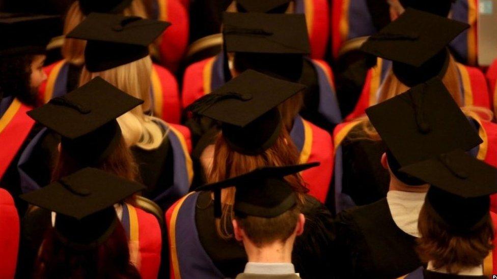 Students at graduation ceremony