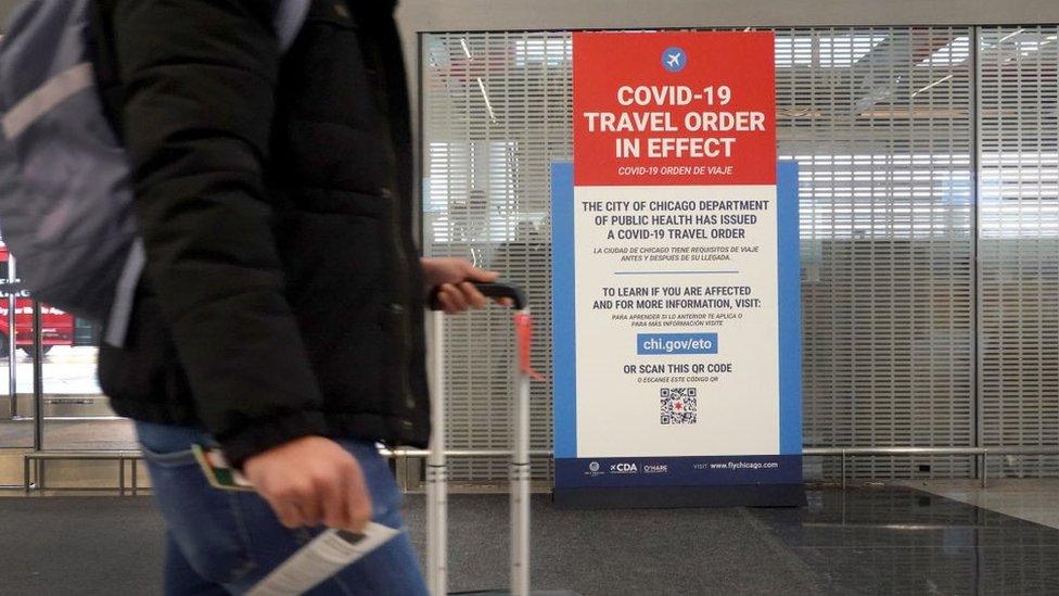 A traveller passes through O'Hare International Airport