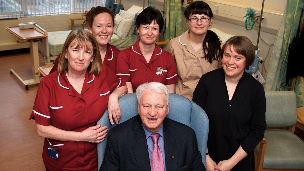 Sir Bobby Robson with staff from the Newcastle Hospitals NHS Trust and his oncologist Professor Ruth Plummer (right)