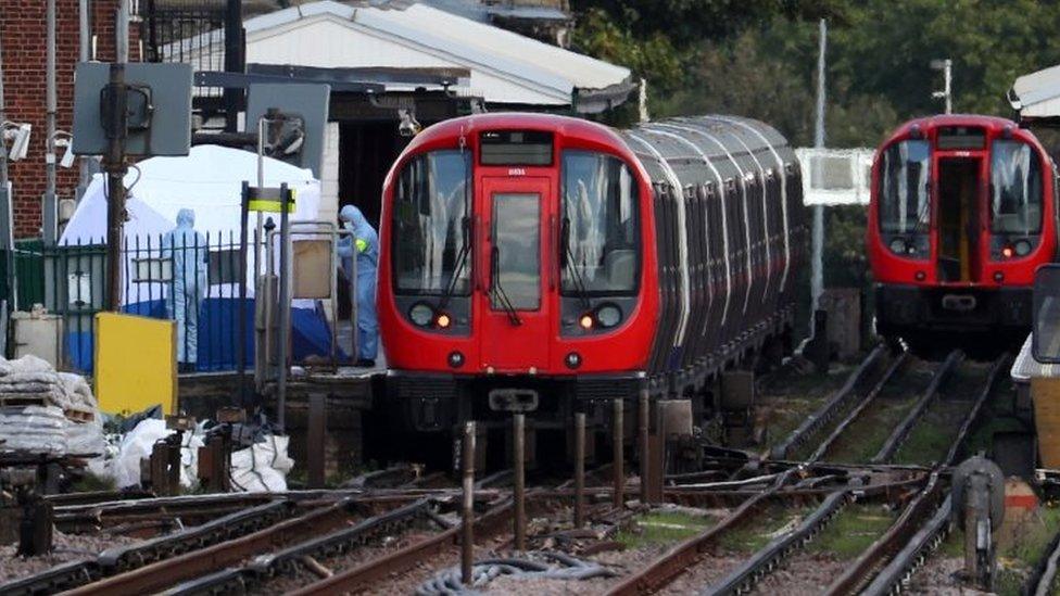 Forensic investigators at Parsons Green tube station