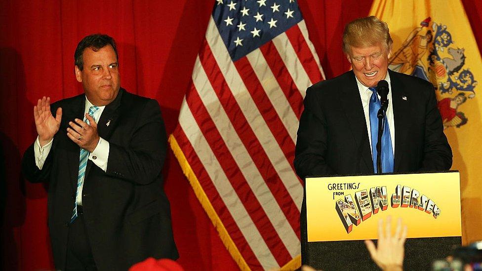 Chris Christie claps as Donald Trump speaks at an event in New Jersey.