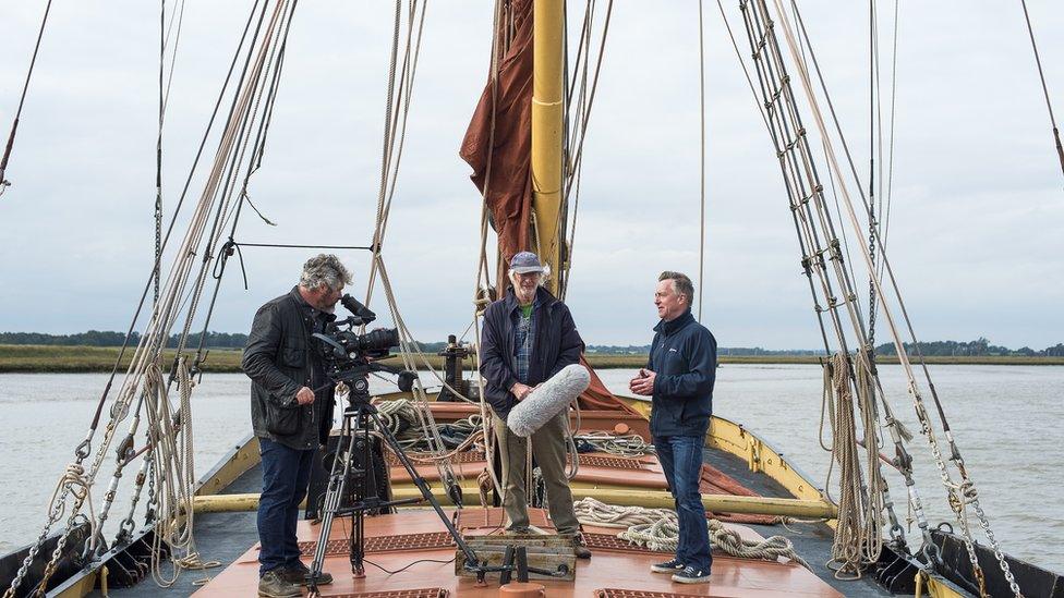 From left, presenter John McCarthy, film producer Malcolm Hodd, and director/cameraman Tim Curtis