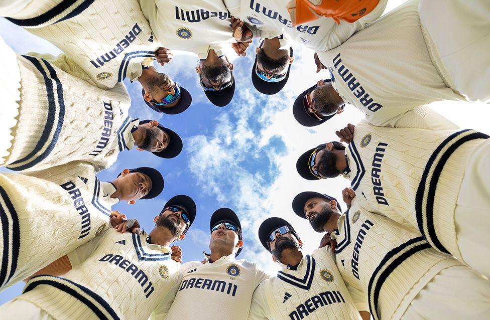 Shubman Gill of India speaks to his team-mates in a huddle during the final day of the second Test against England at Edgbaston.