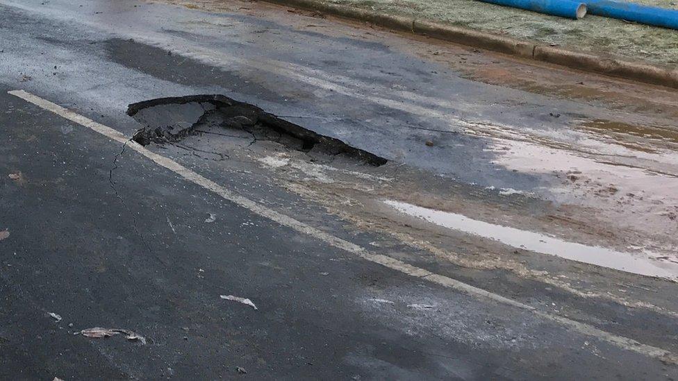 Sinkhole in tarmac road