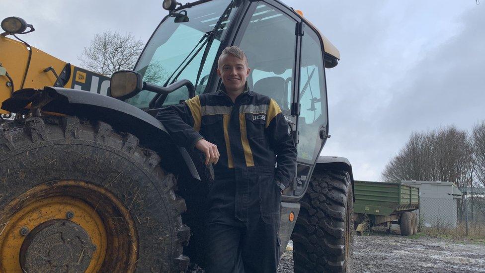 Richard Jones in front of a tractor