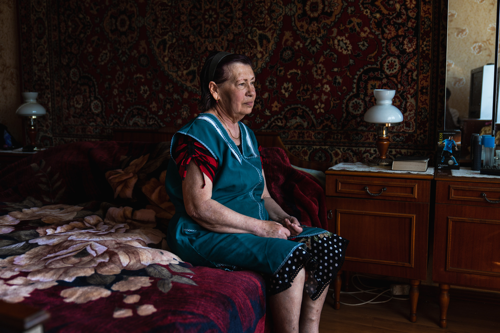 Tamara sits in her bedroom in her half-destroyed building. “It was a beautiful here," she said. "Now there is nothing left"