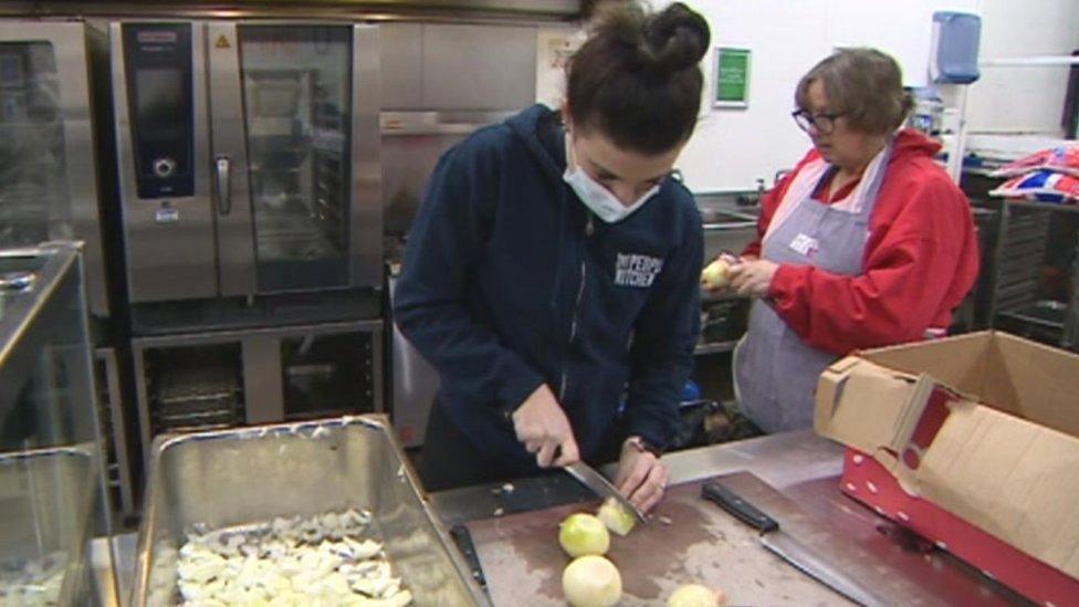 Volunteers preparing food at The People's Kitchen