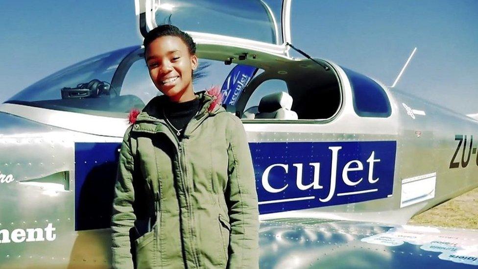 girl-in-front-of-plane