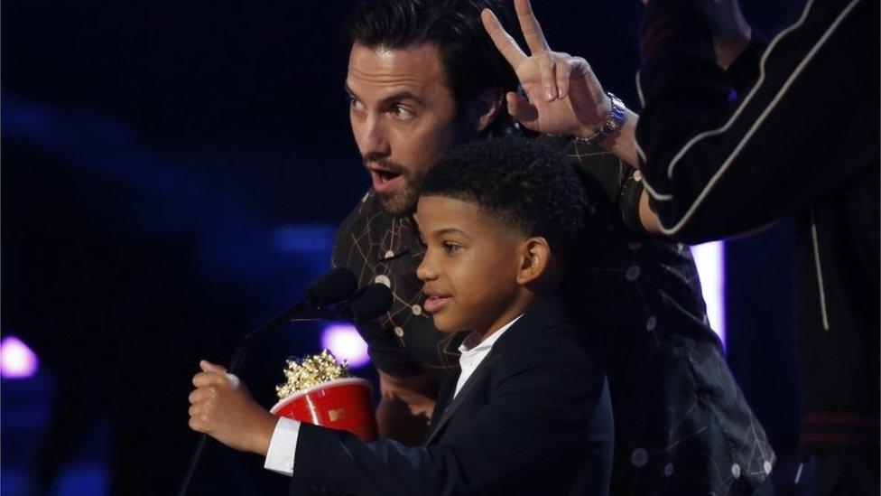 Milo Ventimiglia and Lonnie Chavis accept the award for Best Tearjerker for "This Is Us."