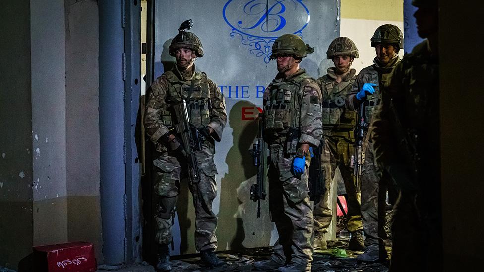 British soldiers secure the perimeter outside the Baron Hotel, on a road that leads to the Abbey Gate, in Kabul, Afghanistan - 26 August 2021