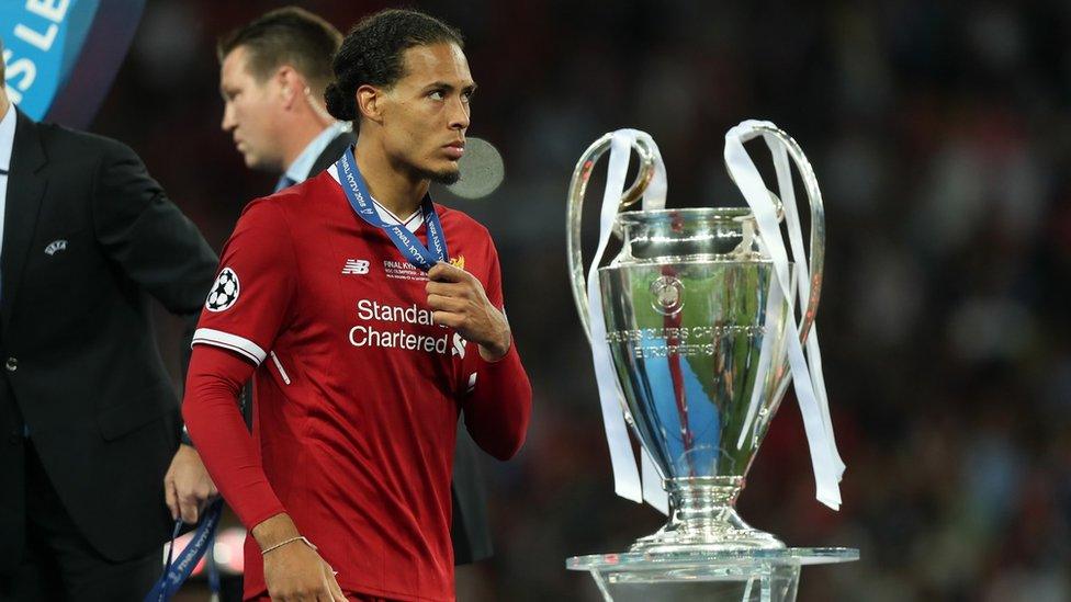 Virgil Van Dijk with Champions League trophy