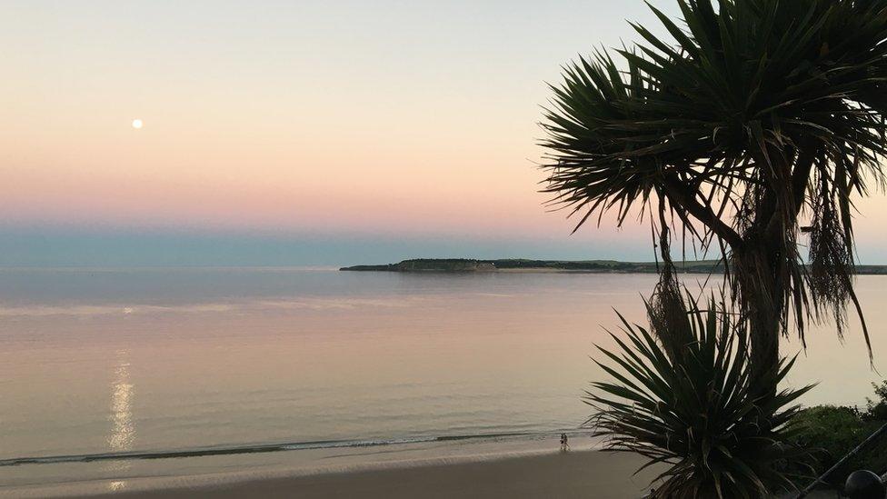 Tenby on a moonlit evening by Joanna Lynas