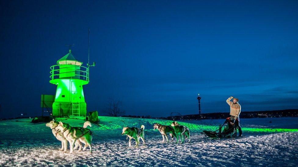 Lighthouse on the frozen Lake Nasijarvi, Finland