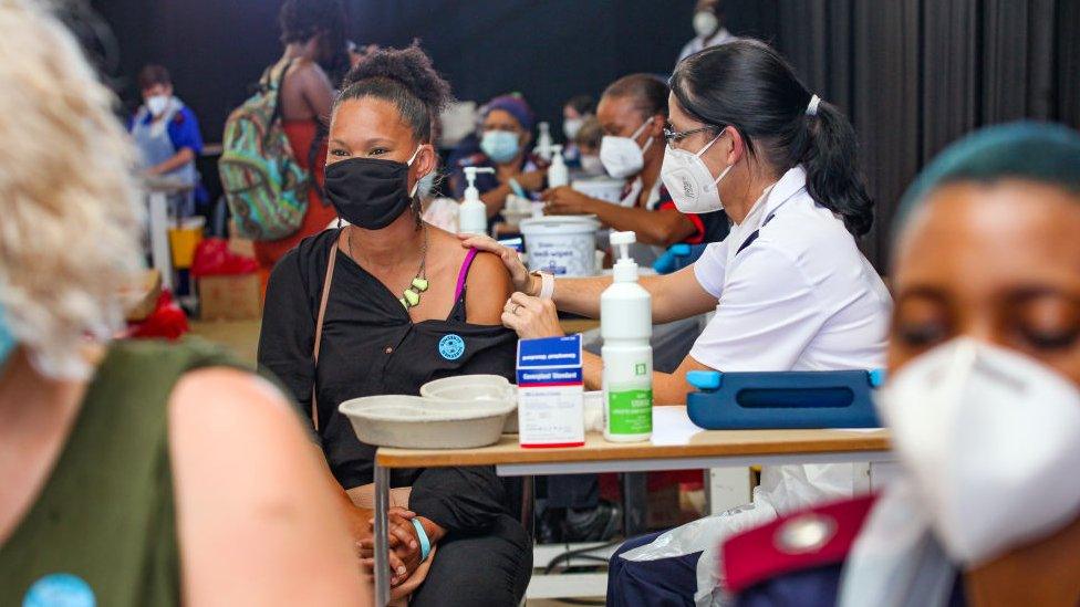 Woman getting vaccinated