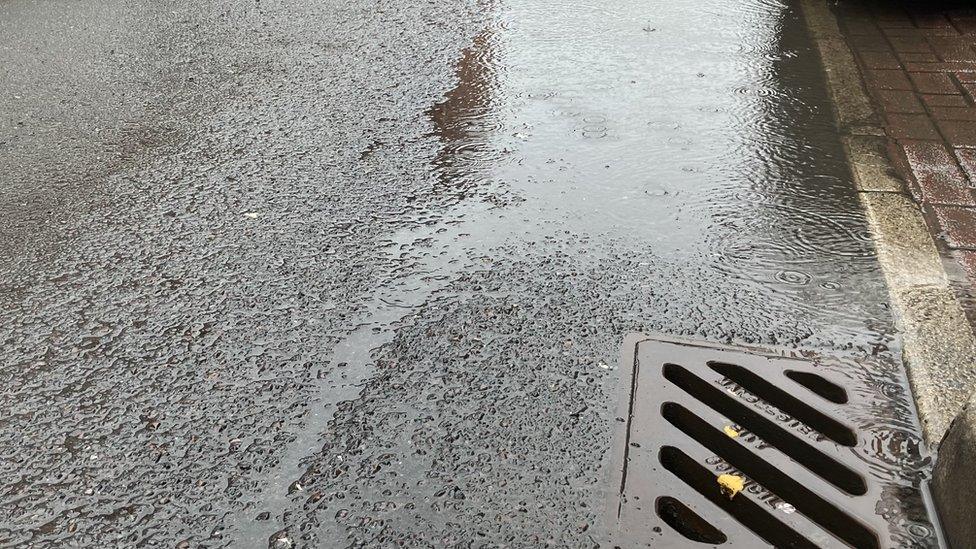 Flooding on a road in Salford