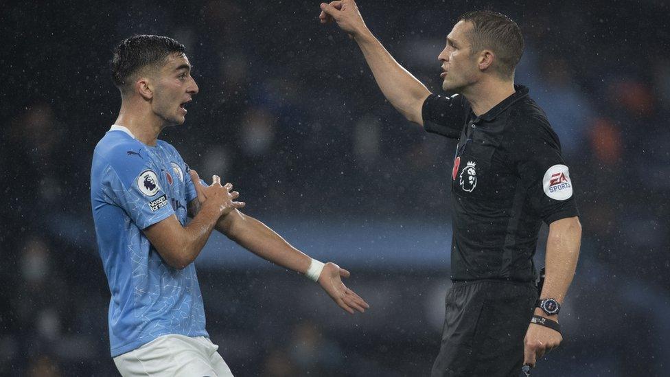 Ferran Torres of Manchester City asks the referee for a hand ball.