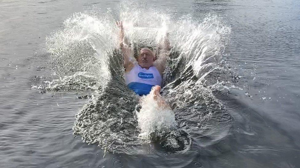 Stuart Golledge jumping into water