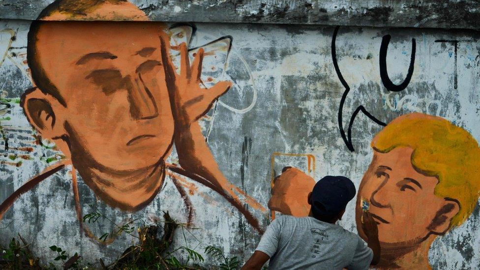 Street art of the "Egg Boy" incident in Indonesia