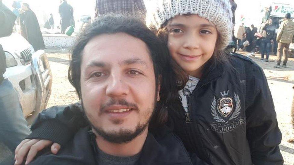 Image of Bana Alabed with a Turkish charity worker after leaving Aleppo - 19 December 2016