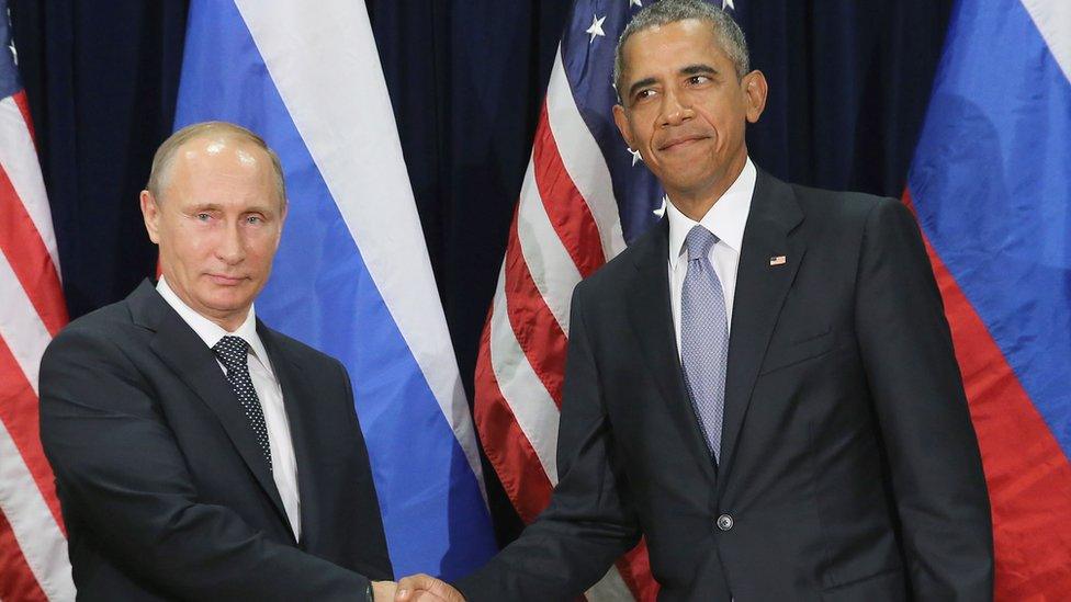 Russian President Vladimir Putin (L) and U.S. President Barack Obama shake hands for the cameras before the start of a bilateral meeting at the United Nations headquarters on 28 September 2015