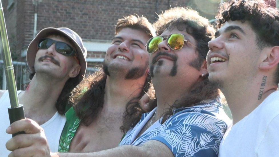 group of friends with mullets