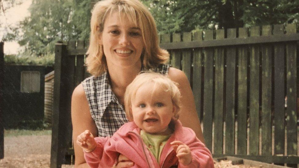 Olivia Jenkins, as a baby, and her mother