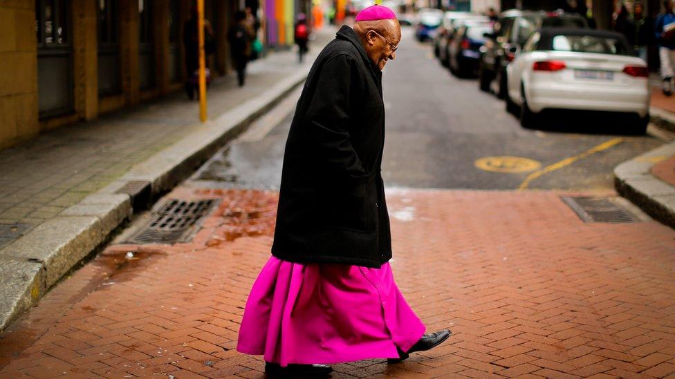 Tutu walking across a street