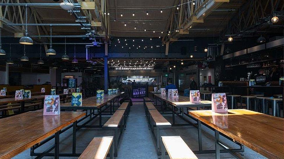 Internal view of tables and seating at Abingdon Street Market