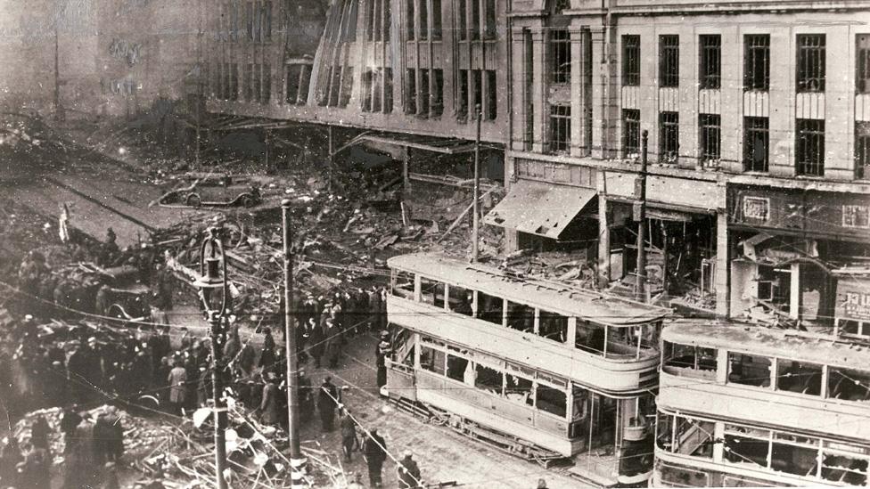 Trams in bombed street