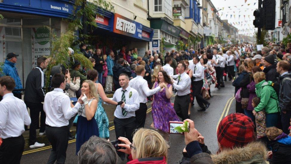 Dancing through Helston for Flora Day