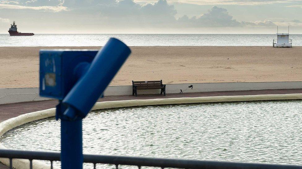 Wide shot of Banksy mural at Gorleston boat pond