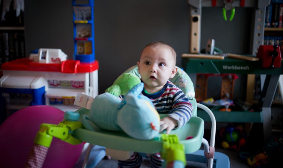 Kaiden in a high-chair