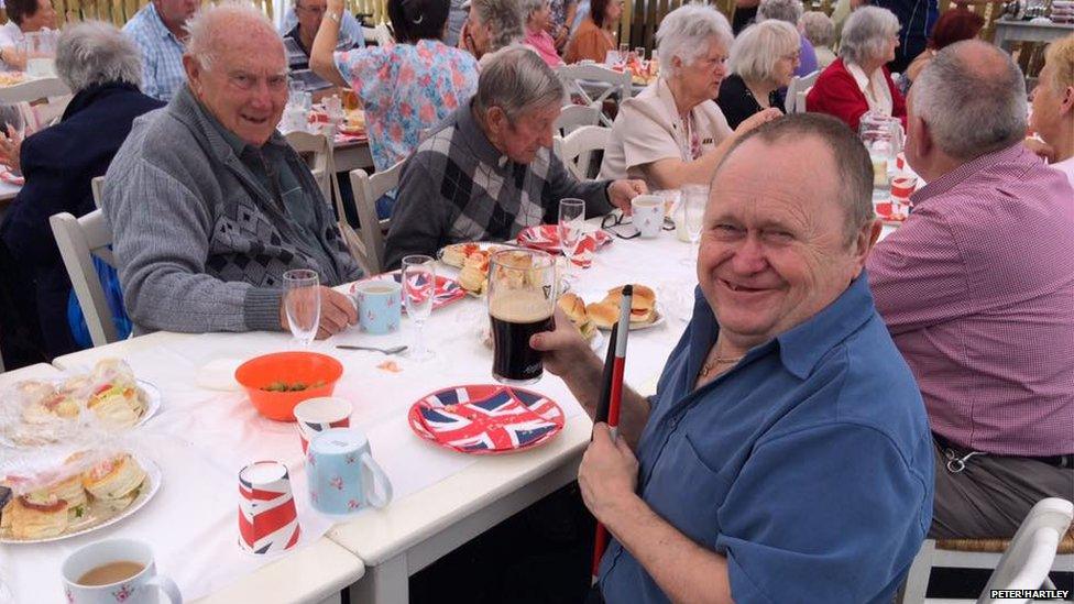 Peter Hartley celebrates with a street party