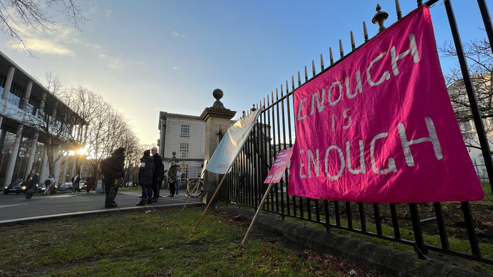 "Enough is enough" read a sign outside Cardiff University