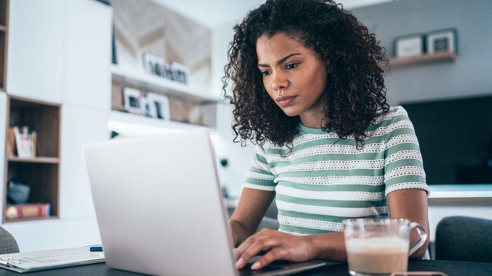 A woman using a computer