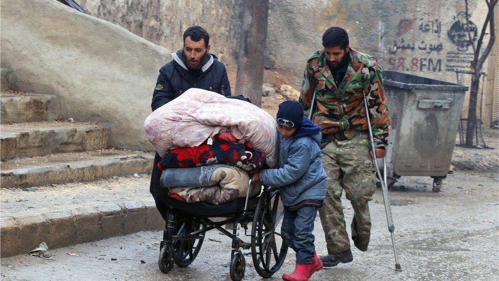 Syrian civilians leave towards safer rebel-held areas in Aleppo, on December 13, 2016,