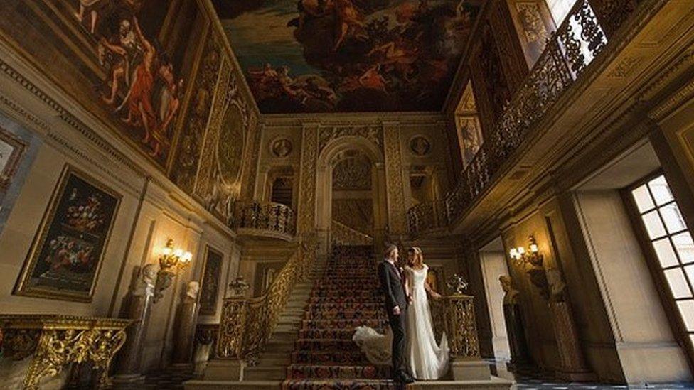 Married couple at stately home