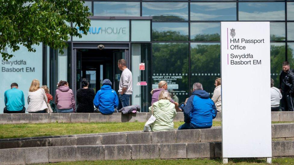 Queues outside passport office in Newport